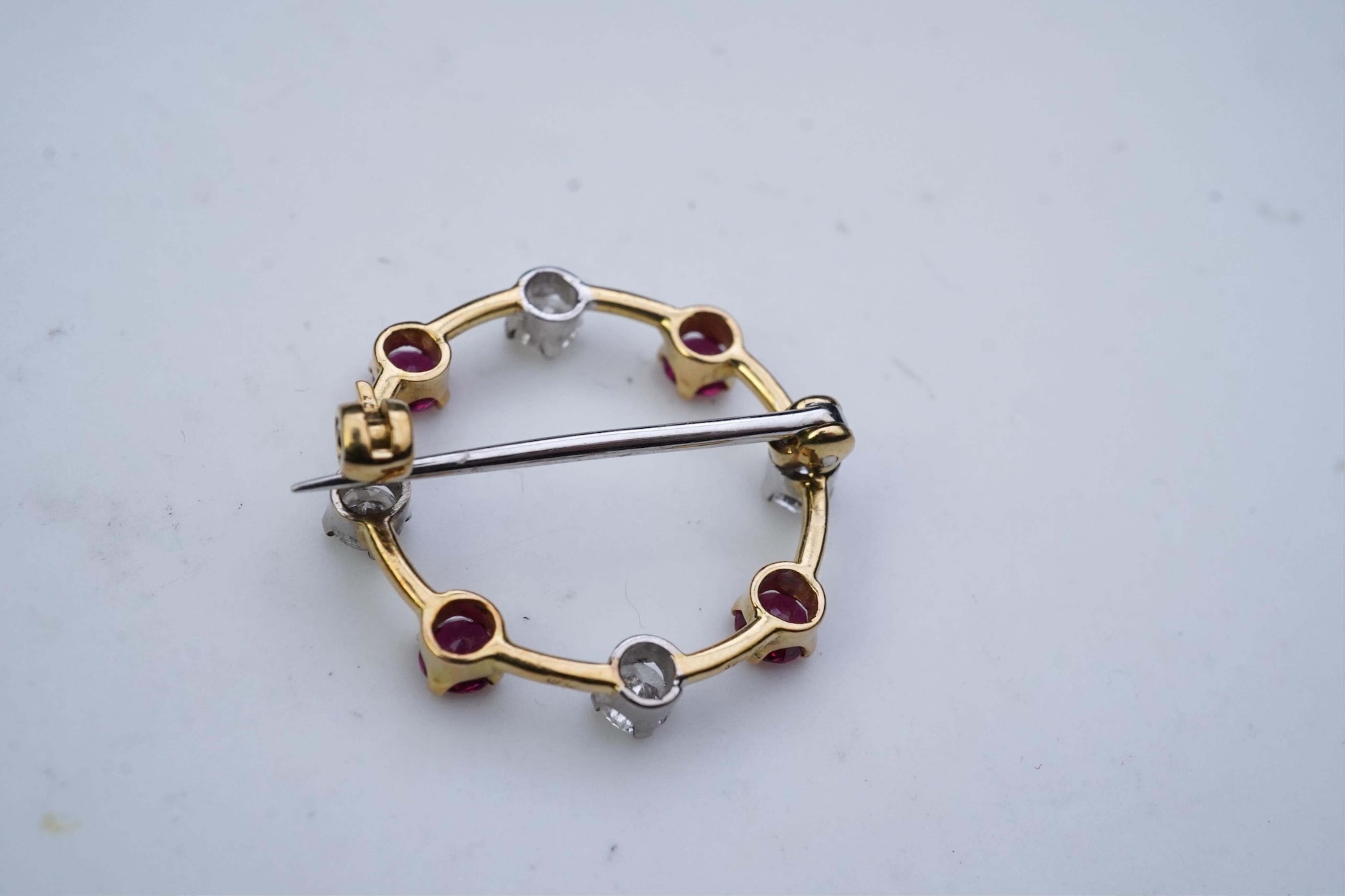 A ruby and diamond brooch